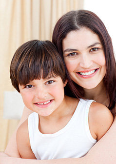 Photo of smiling mother and son